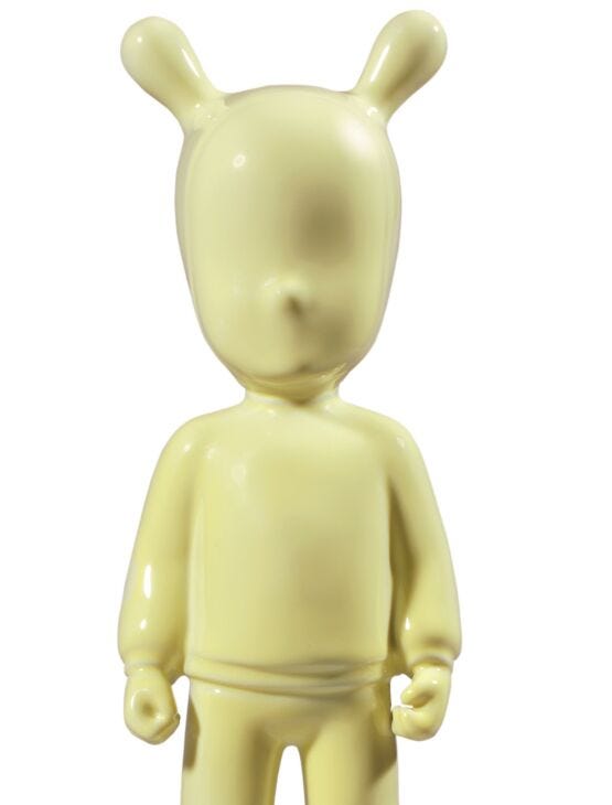 The Yellow Guest Figurine. Small Model. - Lladro-USA