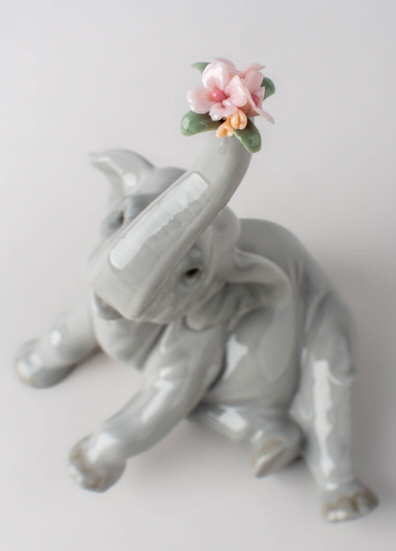 Baby Elephant with Pink Flower Figurine in Lladró