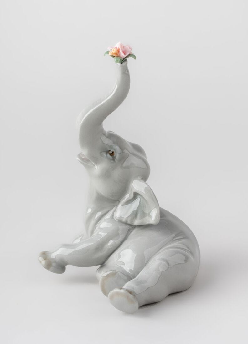 Baby Elephant with Pink Flower Figurine in Lladró