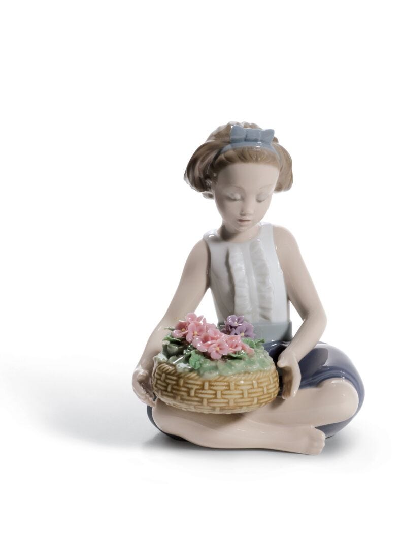 Arranging Flowers Girl Figurine in Lladró