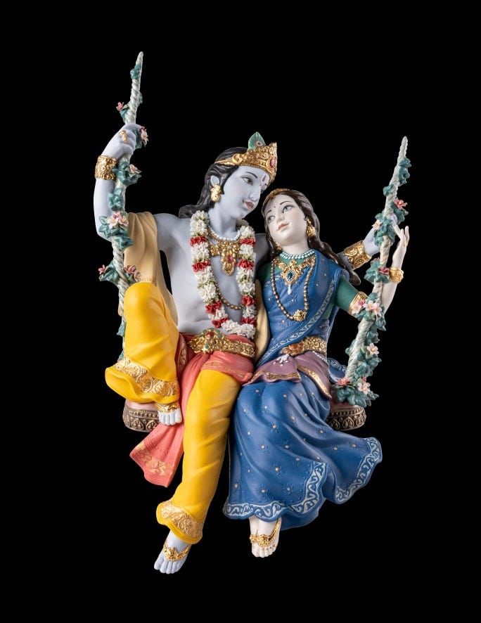 Radha Krishna on a swing sculpture